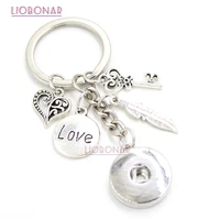 10pcs wholesale diy 18mm snap jewelry snap keychain feather love key chain handbag charm key ring gifts bijoux