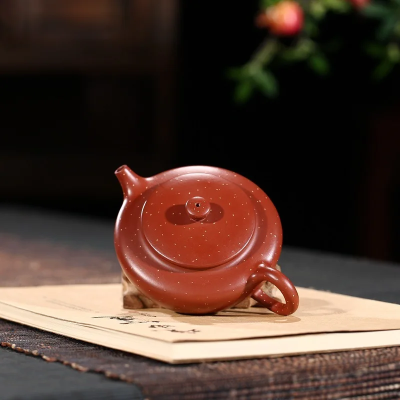 Изготовитель: большой красный горшок из фиолетовой глины в исинской угольной