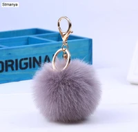 hot christmas gift fur key chain 13 colors fur pom pom keychain gold silver color keychains for women bag key ring jewelry 16007