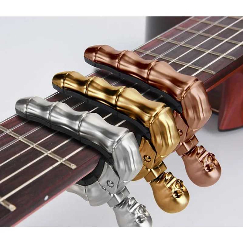 

A pcs Skull Fingers Cool Design Ukulele Acoustic Electric Guitar Capo Silver Bronze Golden Black Capo Guitar Accessories Parts