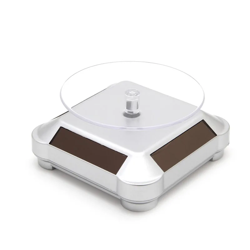 

Solar Power Double-Use 360 Rotating Display Stand Table For Phone Watch Jewelry