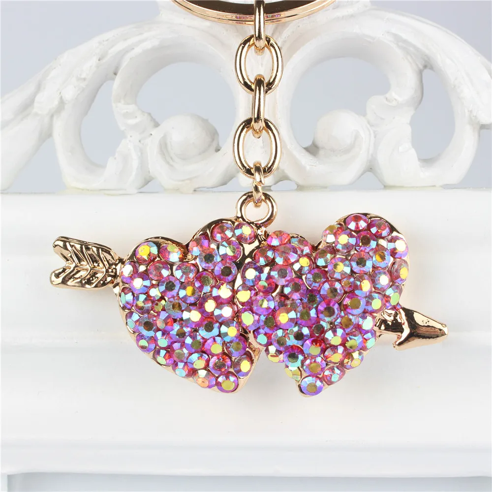 Сумка-кошелек с подвеской в виде стрелы и сердца украшенная кристаллами стразами