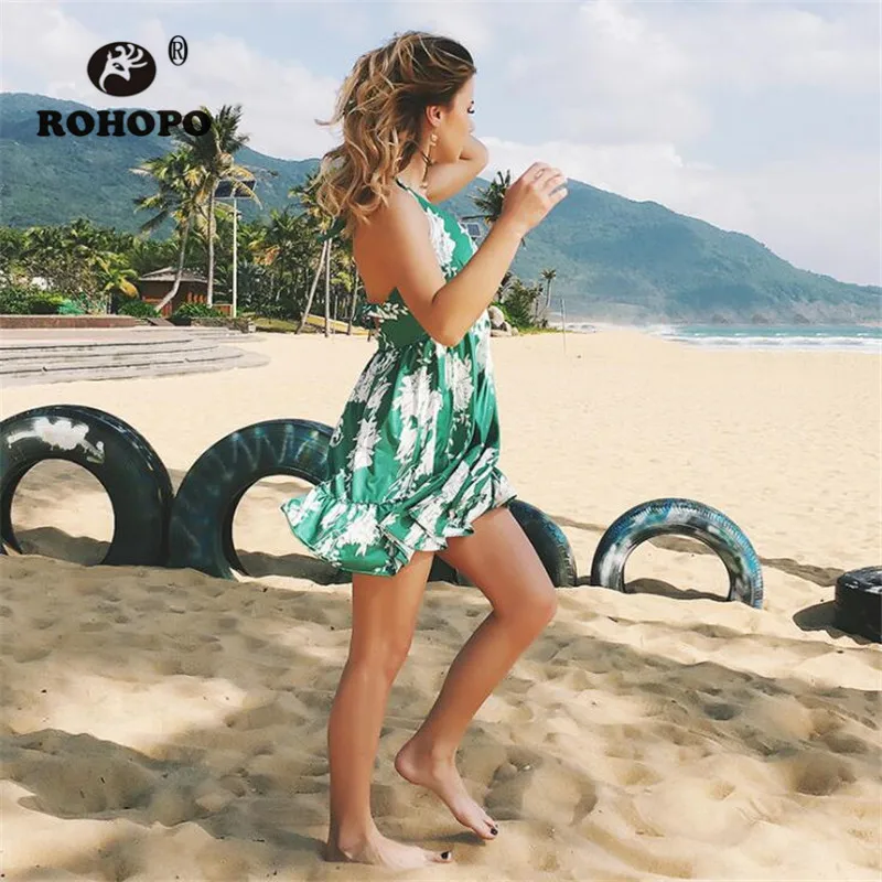 Женское платье без рукавов с глубоким v образным вырезом зеленое летнее бантом и