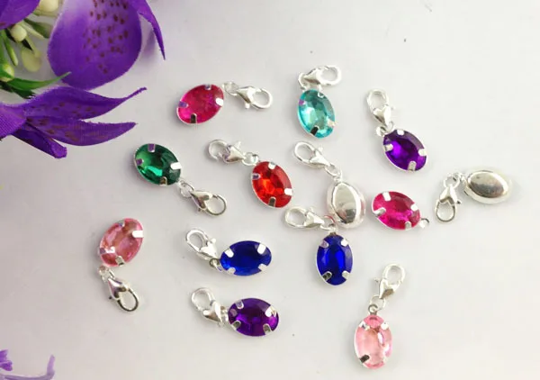 

30PCS Mixed colours of rhinestone oval clip on charms #22661