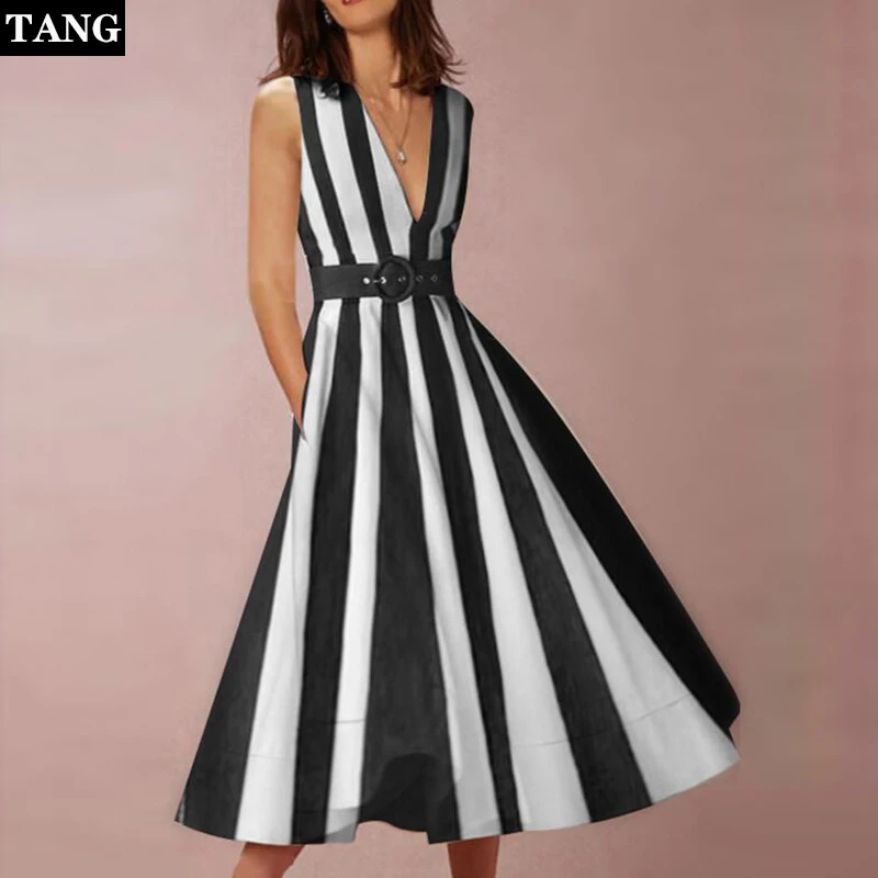 Винтажное платье в черно белую полоску с глубоким v образным вырезом на талии без
