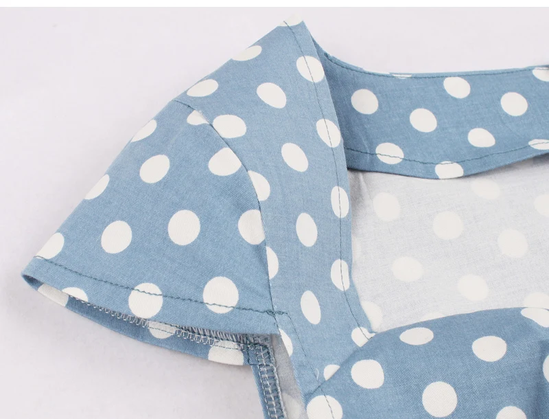 Женское винтажное платье светло голубого цвета в горошек с вырезами завязками