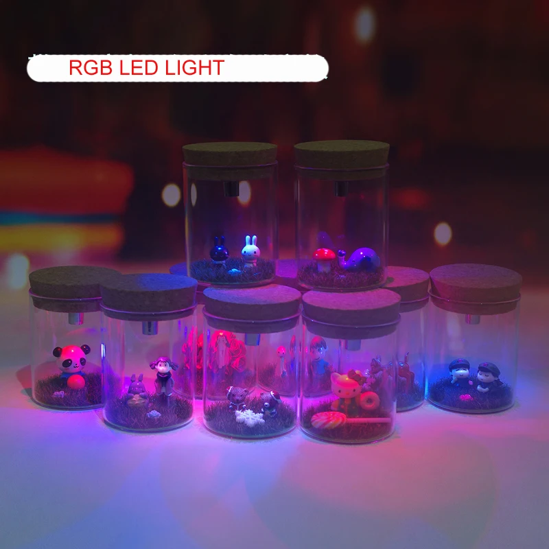 Маленькие прозрачные стеклянные бутылки бутылка Bryophytes и фигурка с пробкой