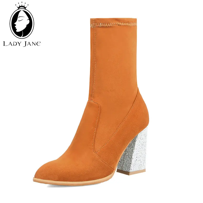 Женские эластичные ботинки до середины икры на каблуке-копытце серебристого