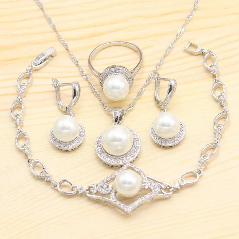 Круглый жемчуг пресной воды серебряного цвета, комплект ювелирных украшений для невесты: браслет, кольцо, серьги, подвеска и ожерелье.