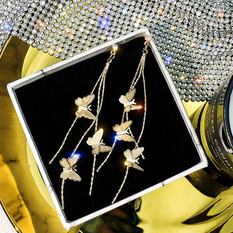 Серьги женские с металлическими бабочками и кисточками корейские