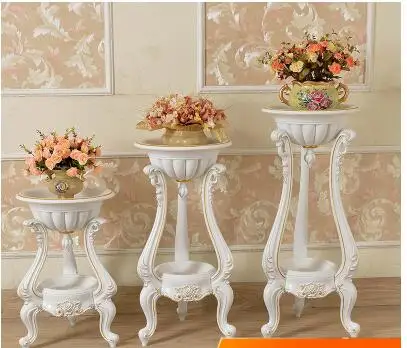 

European flowerpot stand in an interior creative flowerpot shelf..