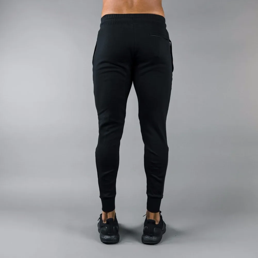 Новинка года. Мужские брюки для бега ALPHALETEGyms. Повседневные модные брендовые спортивные брюки для фитнеса. Мужские повседневные брюки Snapback