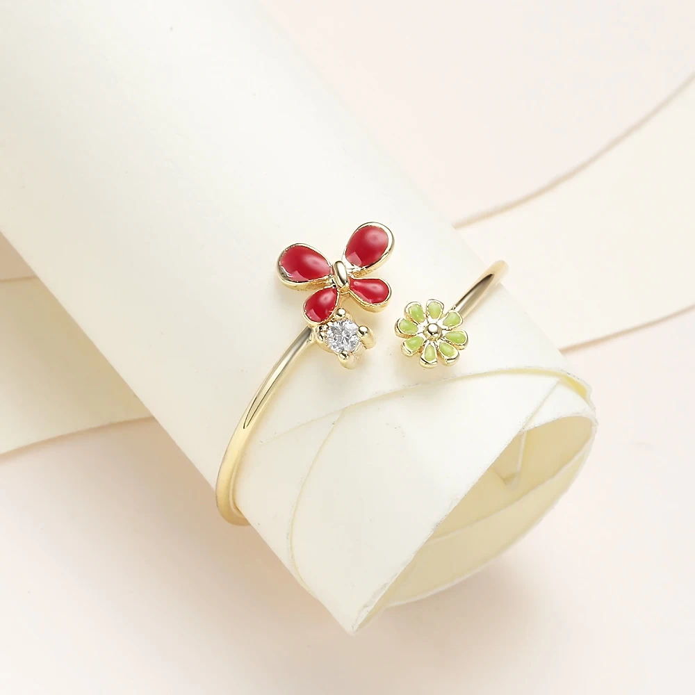 Женское кольцо с маленькими цветами METOO регулируемое золотистого цвета цирконом