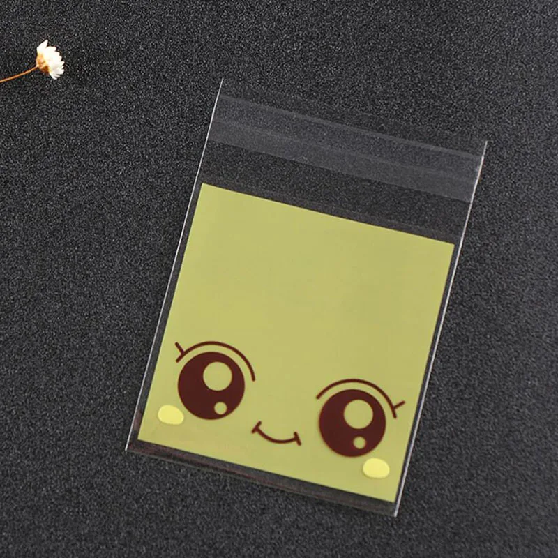 Сумка для упаковки конфет с рисунком большие глаза девочек 100 шт. 7*10 см