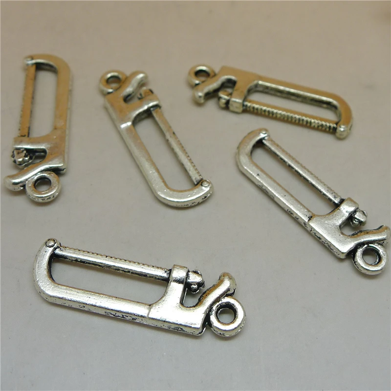 

ALY 100Pcs/lot Antique Silver Saw Charms Vintage Handsaw Charms 26x7mm Handmade Tool Hacksaw Pendant Jewelry Findings
