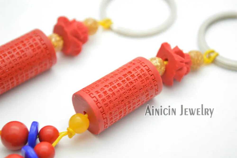 

10pcs Chinese Tibetan Prayer Wheel Red Cinnabar Key Chains 10cm Chinese scriptures Words Carved Keyholder