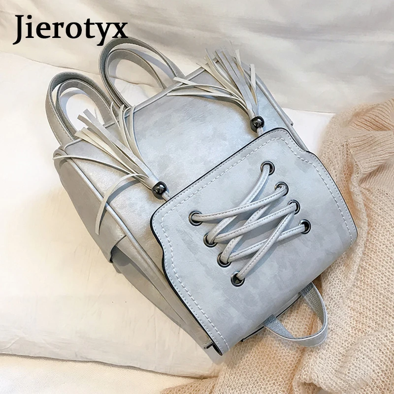 Модный женский рюкзак JIEROTYX черный кожаный с кисточками школьный для девочек