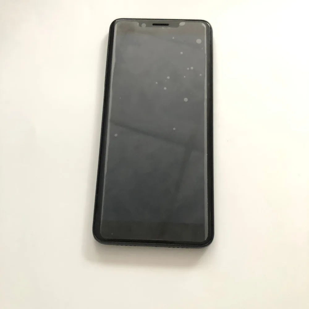 Б/у ЖК дисплей сенсорный экран рамка для смартфона DOOGEE X60L MTK6737 четырёхъядерный 5