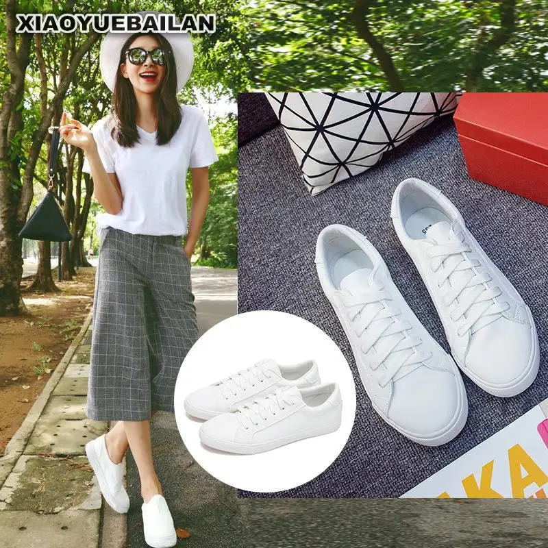 Парусиновая обувь на низком каблуке женская белого цвета с кожаным ремешком