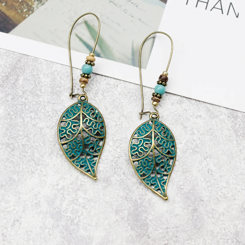 Женские длинные серьги подвески с полыми металлическими листьями Verde Le foglie