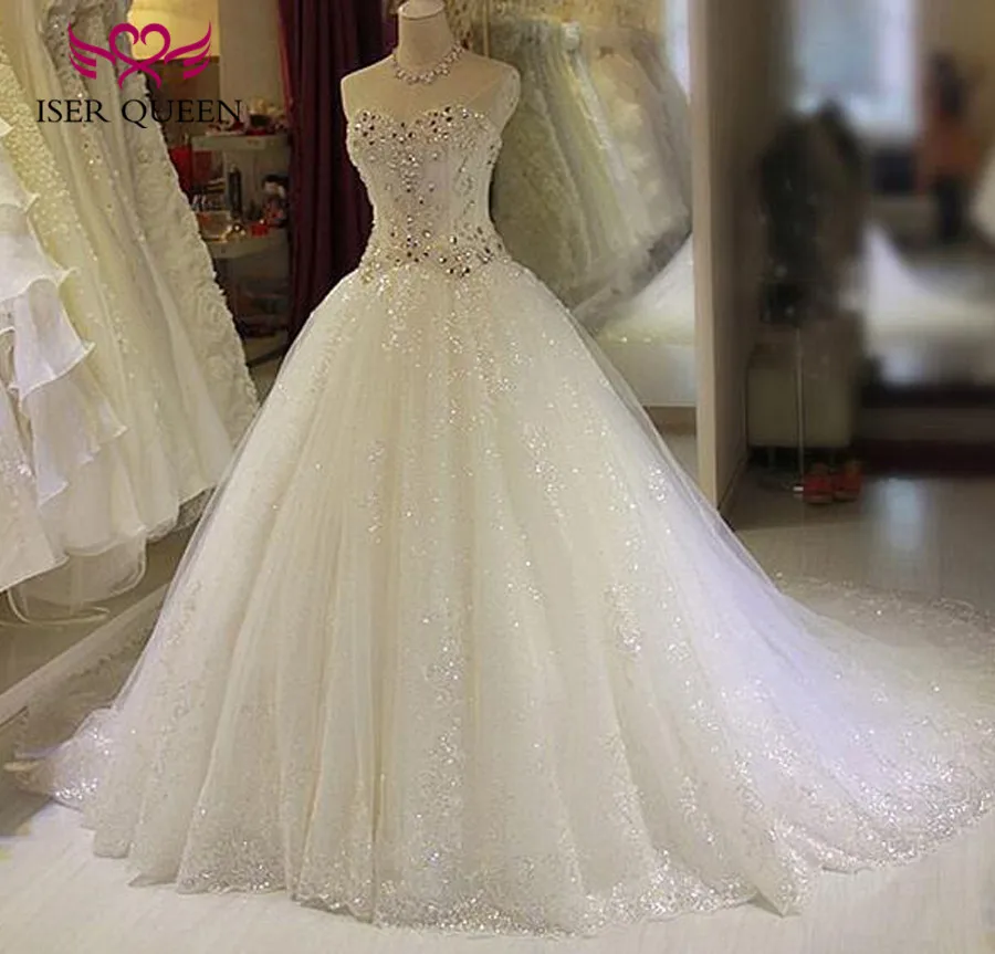 

Luxury Crystal Wedding Dress New Off Shoulder Sweetheart Neckline Ball Gown Bright Lace Tulle Arab Wedding Dresses WX0135