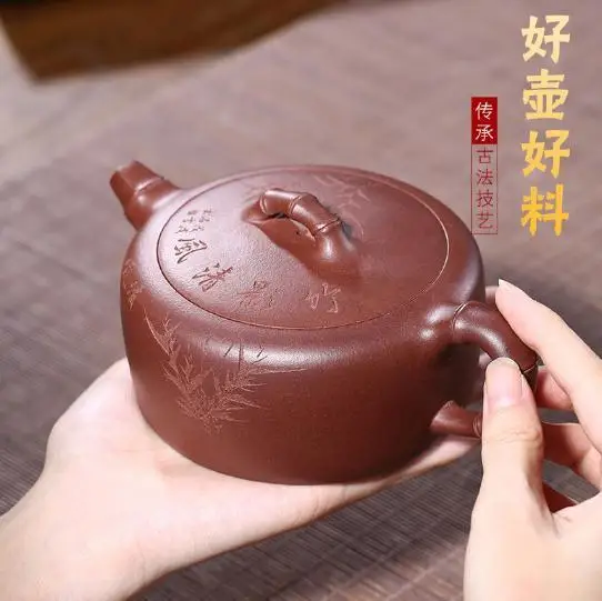 

pot artist in Yixing, is a traveling tea set gift for the old purple clay bamboo knot and the vast purple clay pot.