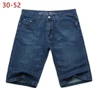Мужские тонкие джинсовые шорты размера плюс 30-52, летние мужские классические повседневные хлопковые эластичные пляжные бермуды, мешковатые короткие джинсовые брюки большого размера