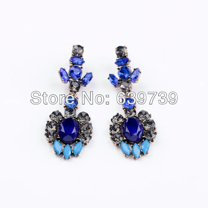 Винтажные антикварные серьги из разноцветной смолы золотого цвета по оптовой