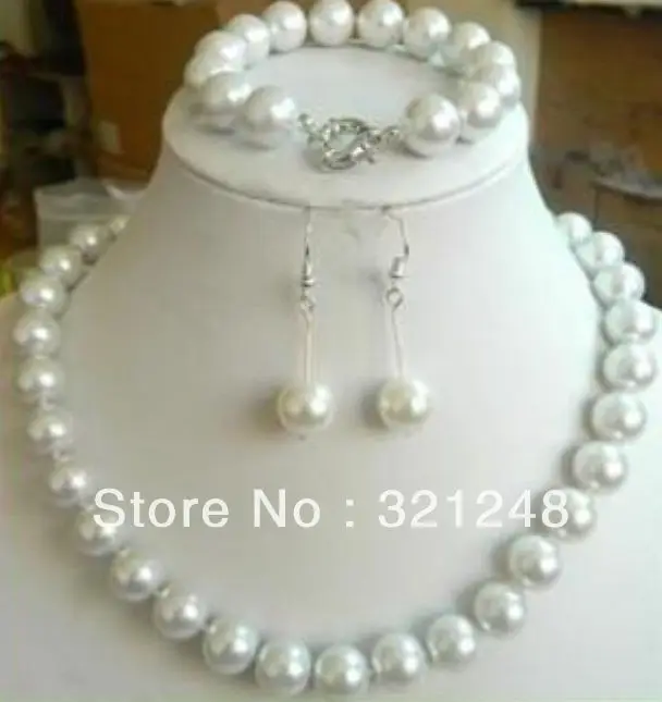 

Элегантное ожерелье и серьги из белого искусственного жемчуга с круглыми бусинами 12 мм Женский бриллиантовый комплект ювелирных изделий ...