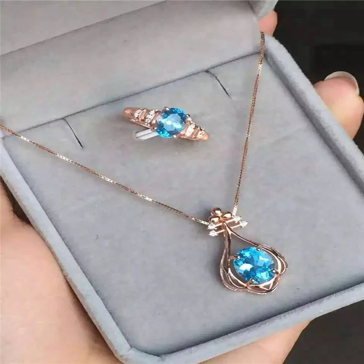 

KJJEAXCMY boutique jewels 925 sterling silver inlaid with blue topaz ring + pendant + necklace with silver gold color.