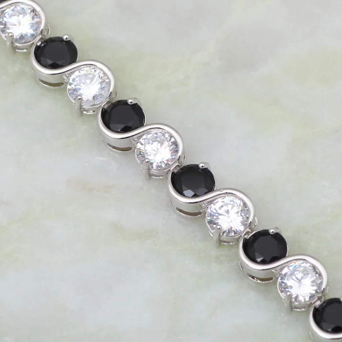 Бижутерия оптом и в розницу белого черного цвета с украшением виде кристаллов