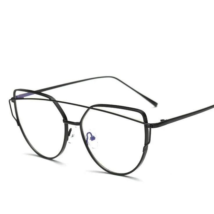 Очки в многоугольной металлической оправе из розового золота с прозрачными