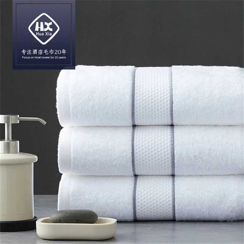 

Five-star hotel white cotton bath towel home soft and absorbent does not lint strong water absorption 140*80cm about 560g