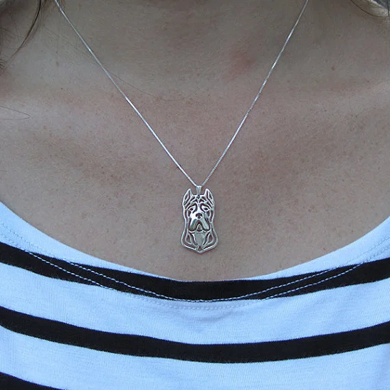 Цепочка с подвеской в виде собаки золотистого и серебристого цвета | Украшения