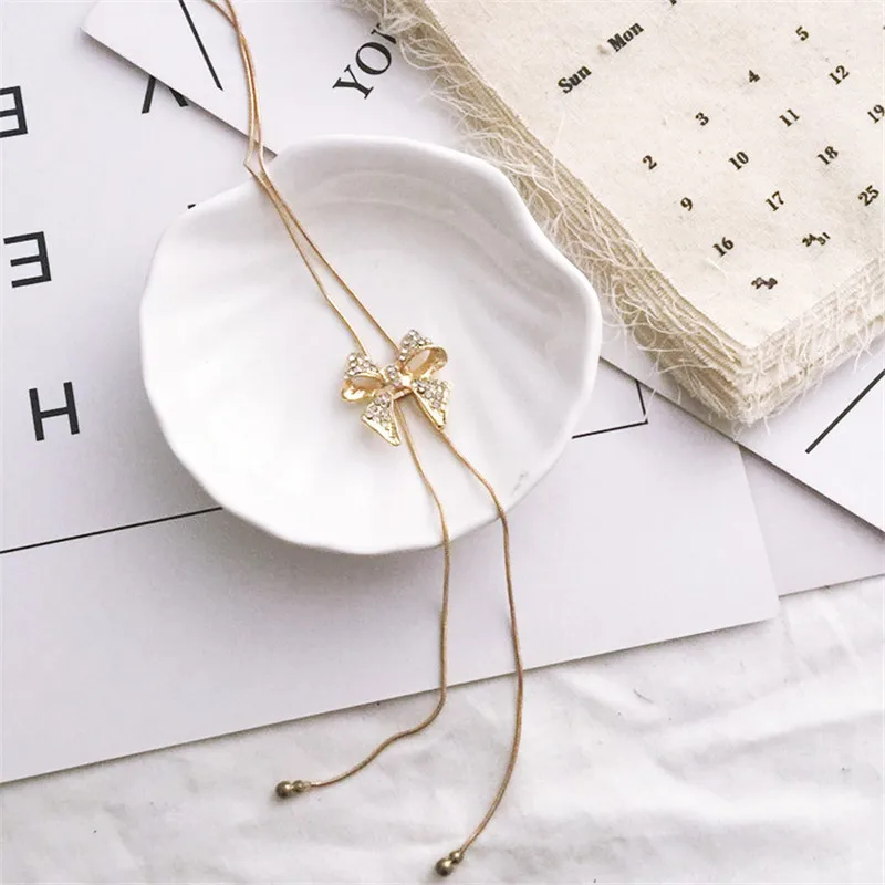 1 шт. Высокое качество кулон Цепочки и ожерелья Золото Серебро шипованных бантом