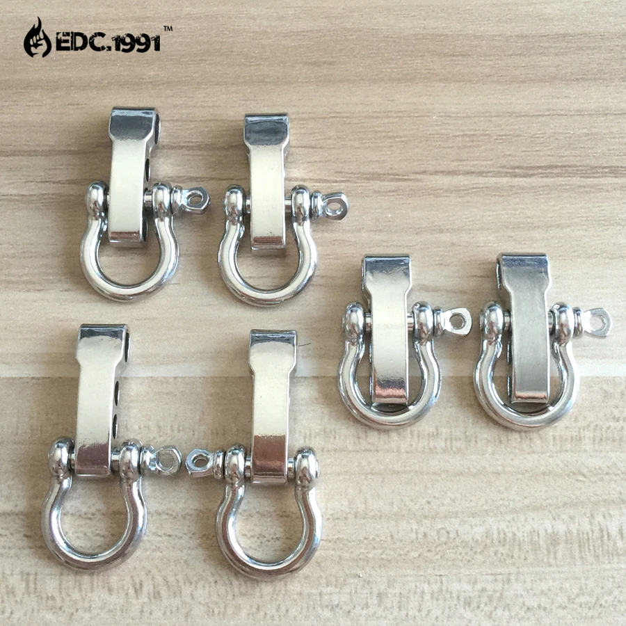 Koop 200 STKS D Boog Rvs Verstelbare 550 PARACORD PARACHUTE CORD LANYARD OVERLEVEN ARMBAND BEUGEL GESP Accessoire Grillete