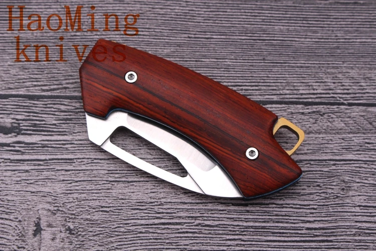 Mini Tactical Folding Knife D2 steel blade Camping Survival pocket Knives Keychain EDC Tools Outdoor Defensive hunting equipped |