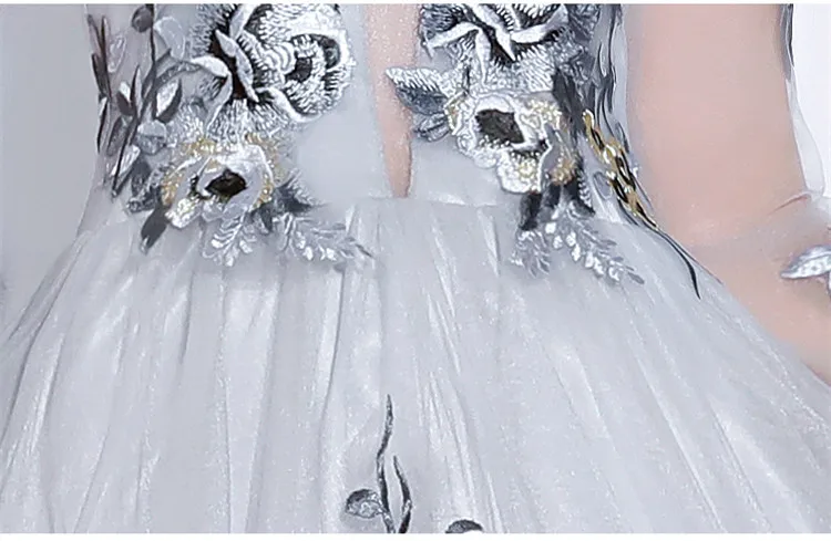Женское вечернее платье с глубоким вырезом Robe De Soriee серое высоким воротом и