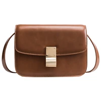 forestry bag girl autumn and winter new street fashion wind restoration simple oblique bag small lock button tofu purse