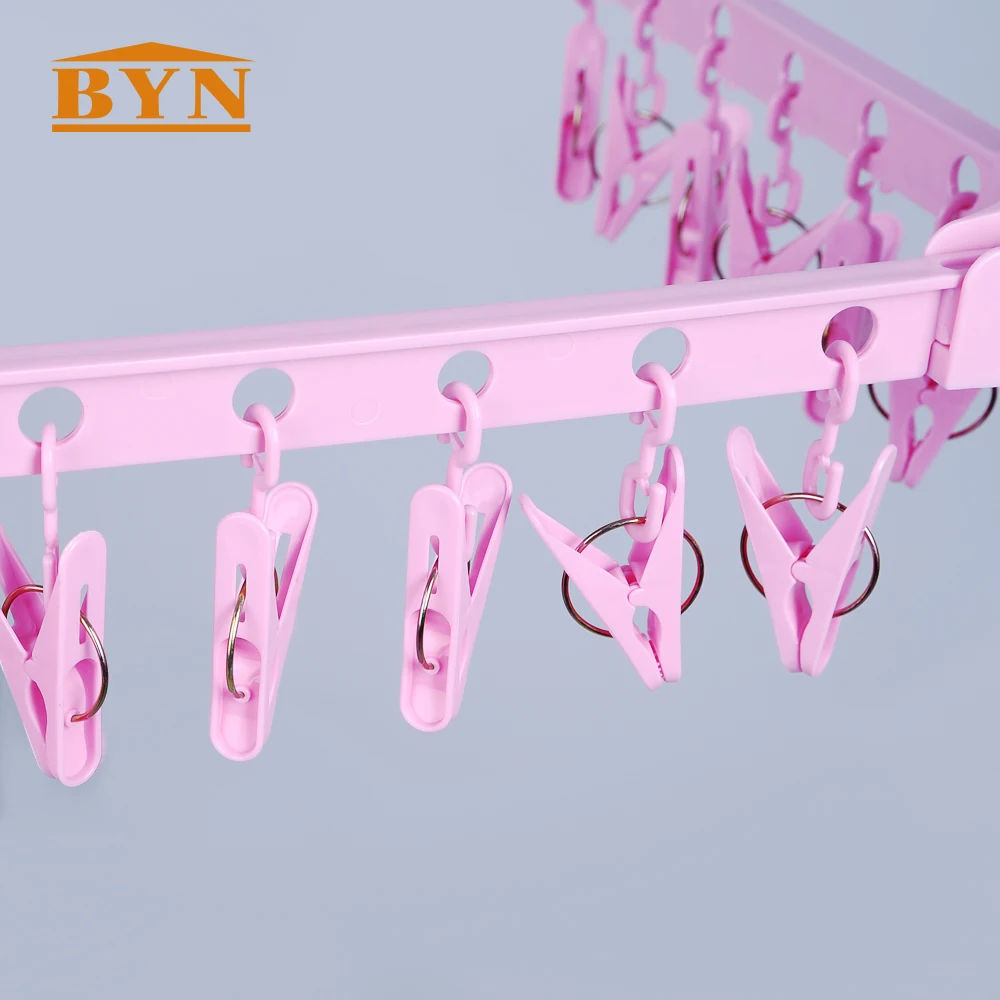 Розовая складная пластиковая вешалка для носков BYN многофункциональная нижнего