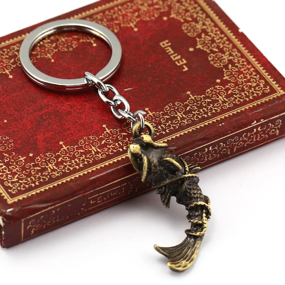 

2016 Vintage Jewelry Bronze Metal fish shape Charm Pendant keychain Time Raiders men women animal Key chain key holder