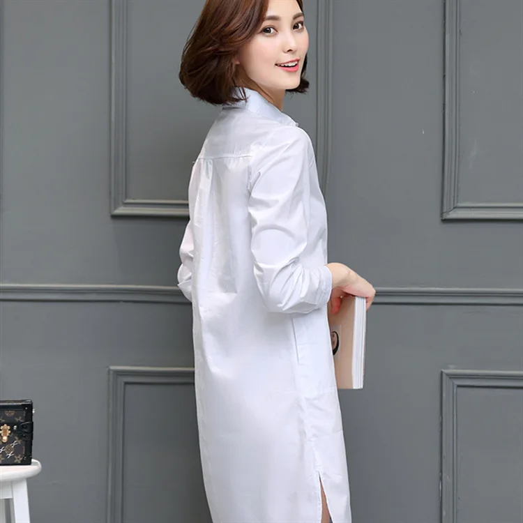 Женская блузка с большими карманами черная или белая средней длины разрезом на