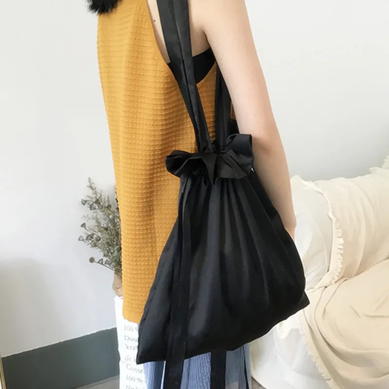 Сумка ранец на шнурке одно плечо модная однотонная женская сумка ремне