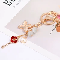 creative crystal rhinestone clover key chain car keyrings female cute flower keychains women bag pendant key rings wholesale