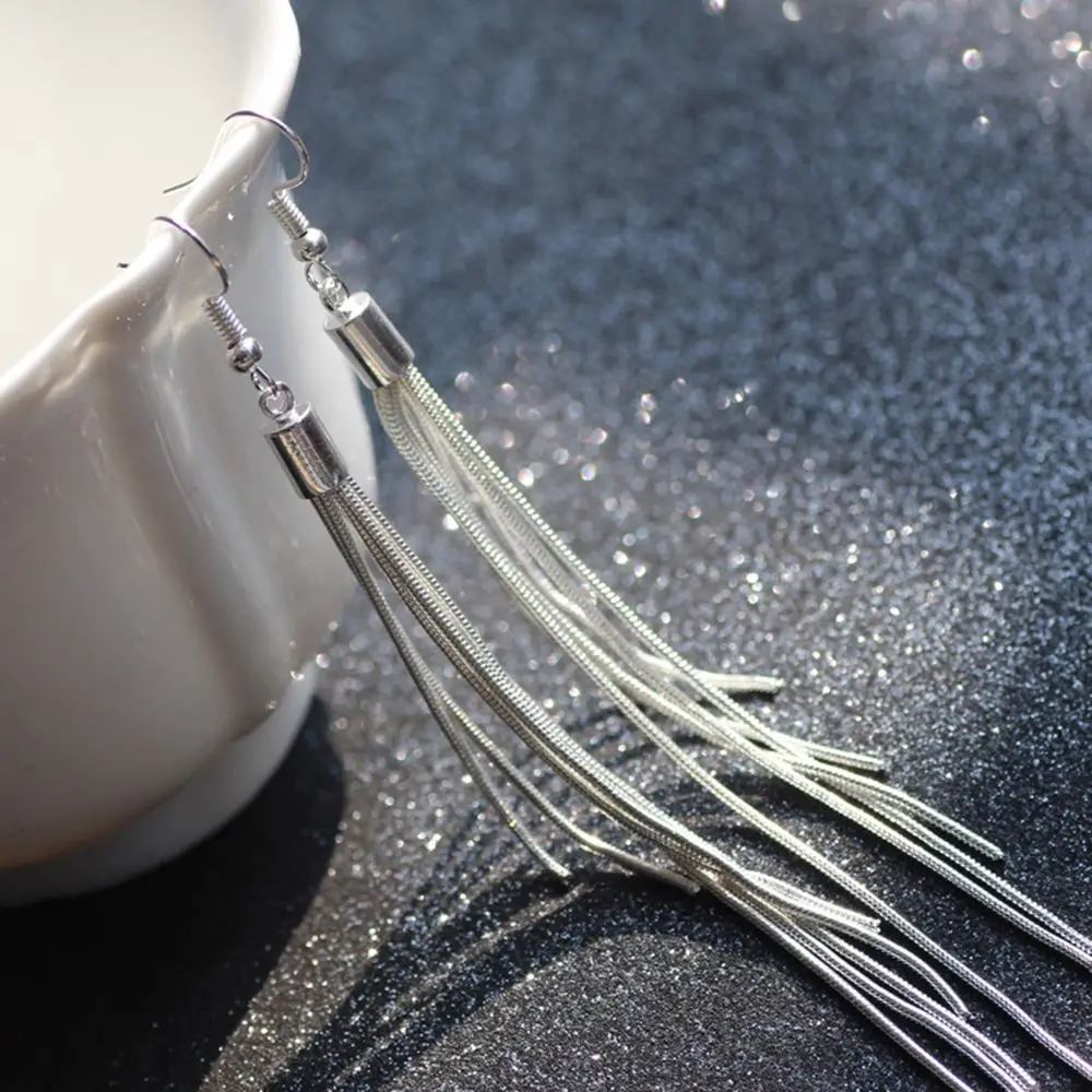 Новые винтажные длинные висячие серьги серебряного цвета с кисточками