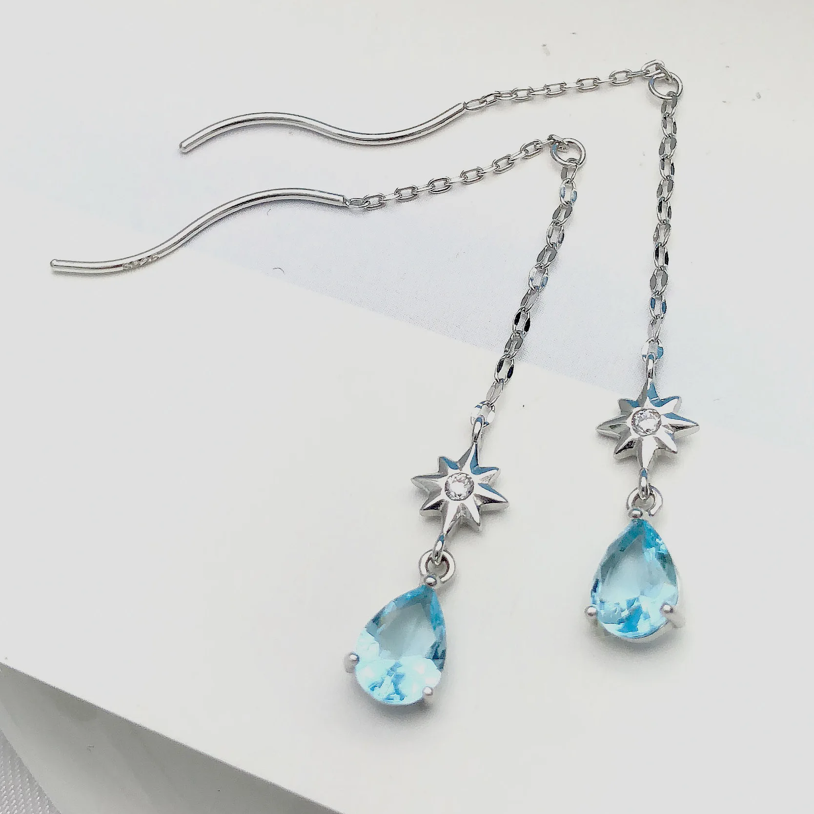 Серьги подвески женские из серебра 100% пробы с голубыми
