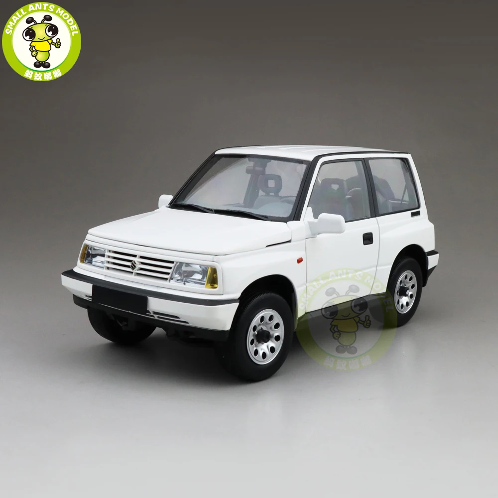 1/18 DORLOP Suzuki Vitara Escudo с левым приводом Модель автомобиля игрушки детские подарки для мальчиков девочек белого цвета