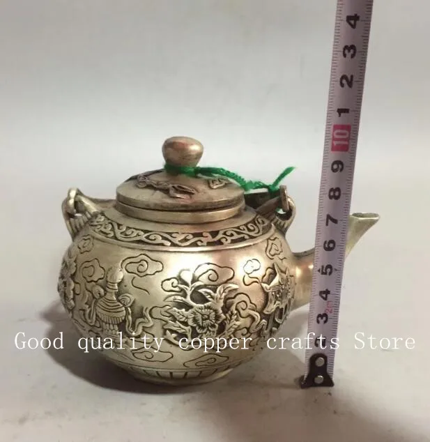 

Collectible archaize white copper eight treasure teapot