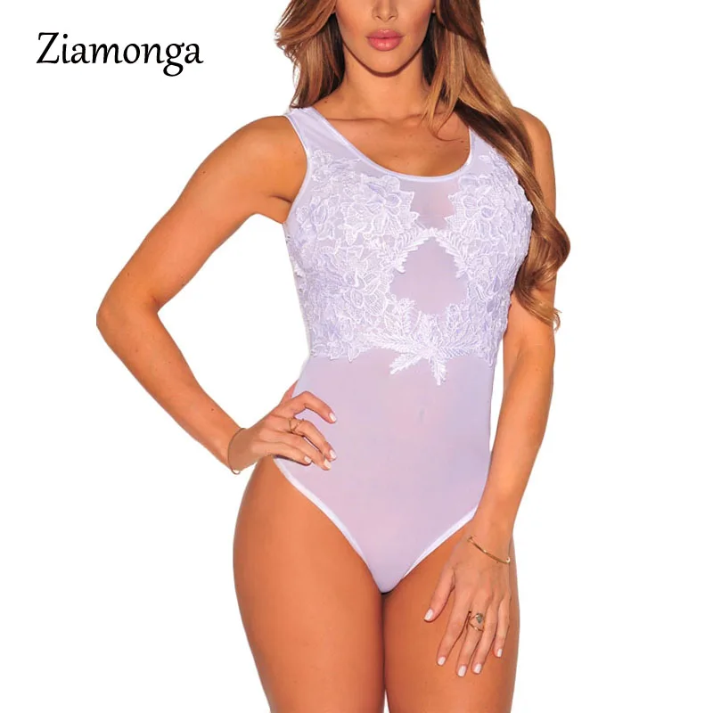 Женский комбинезон с открытой спиной черный облегающий леопардовым принтом