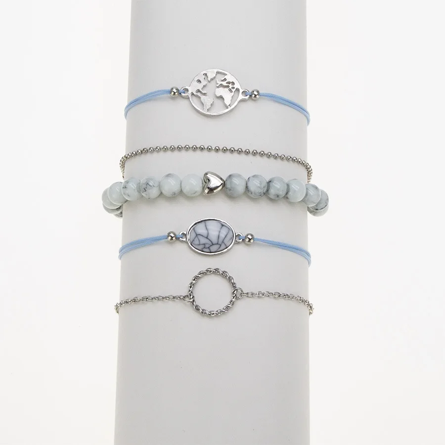 Женский винтажный браслет с шармами подвесками в виде карты мира и сердца